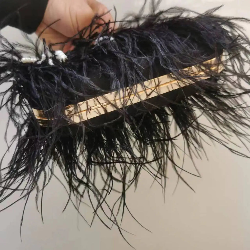 The Feather Clutch