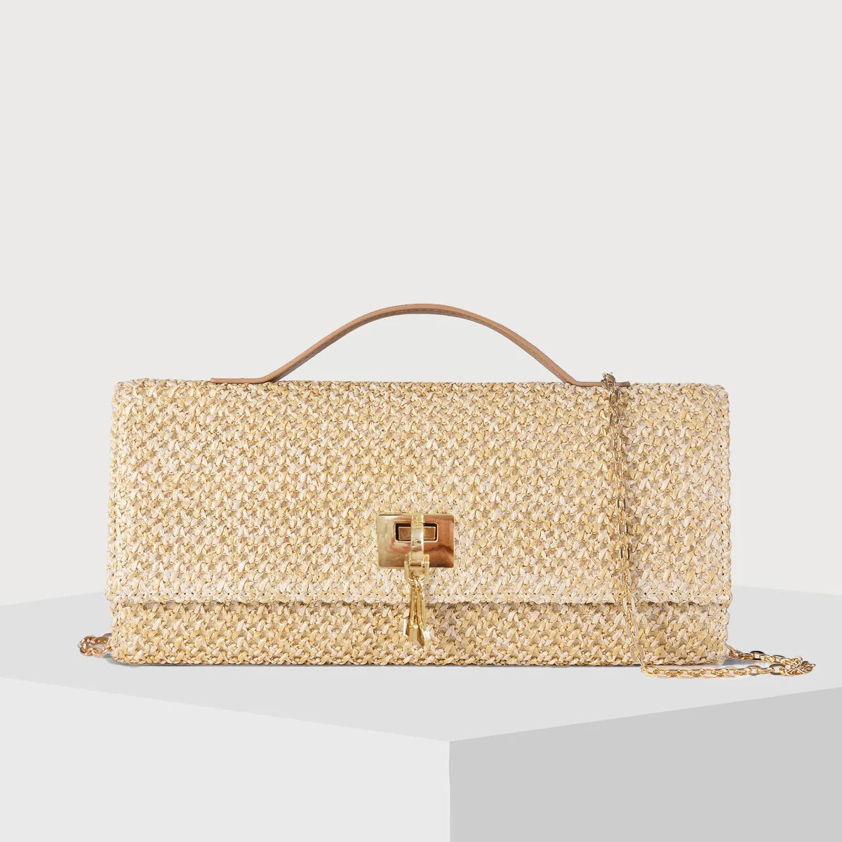 The Woven Straw Clutch
